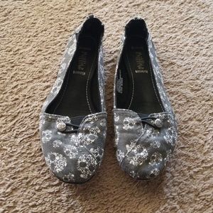 Dark grey flats with white skull details